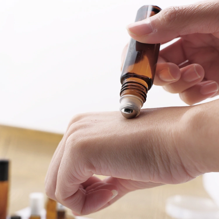 mixing essential oils in roller bottles